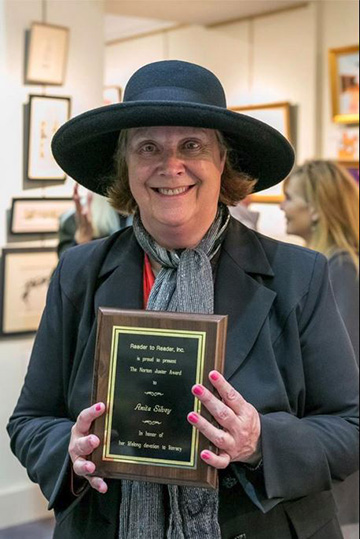 Anita Silvey receiving the Norton Juster Award from Reader to Reader Inc.